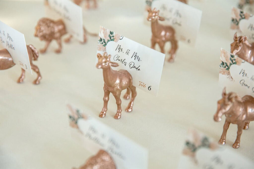 Gold Animal Escort Card Holders on Guest Table